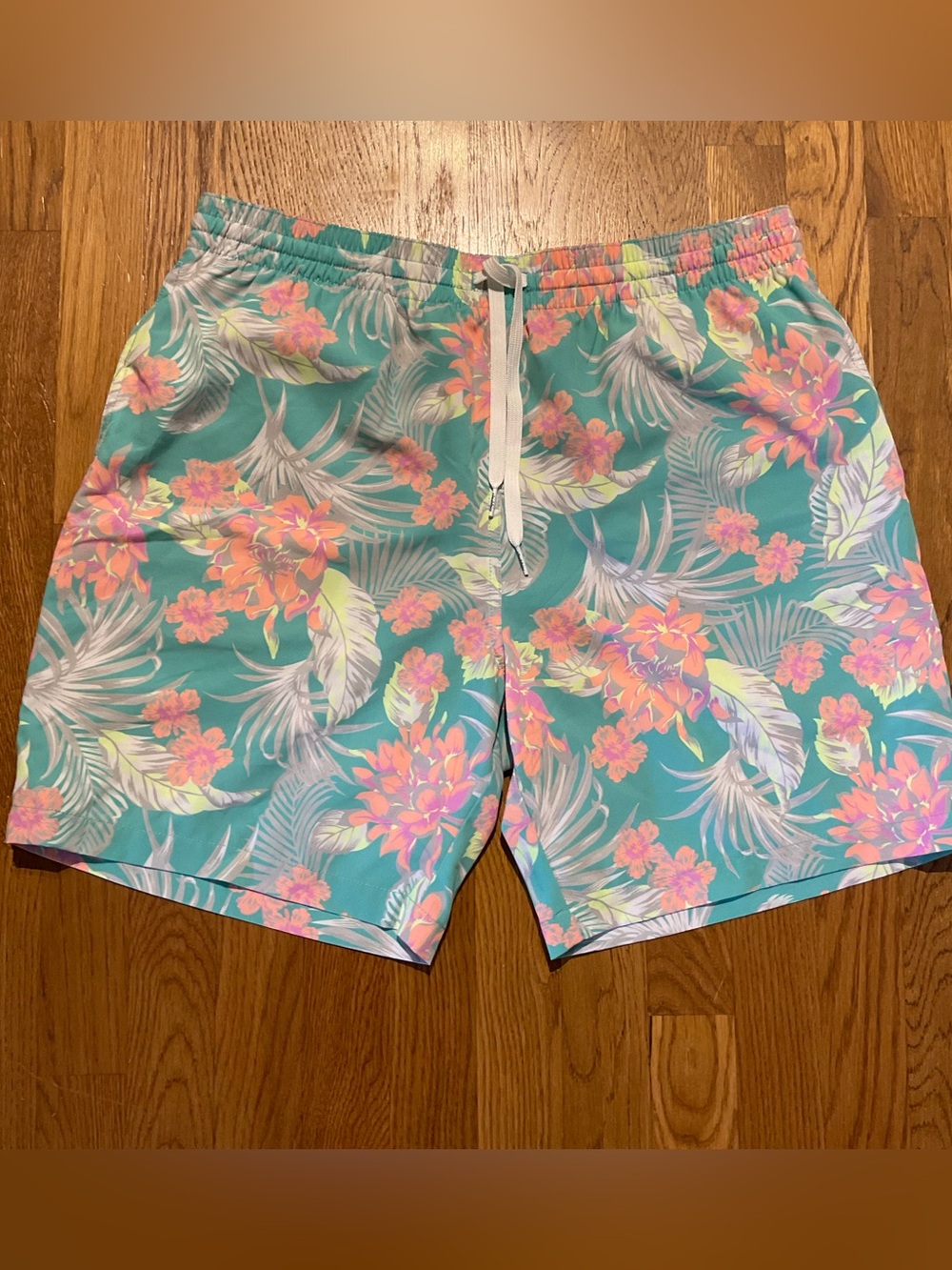 chubbies - Teal Swim Lined Shorts with FloralCoral and Pink Accents. Size XL